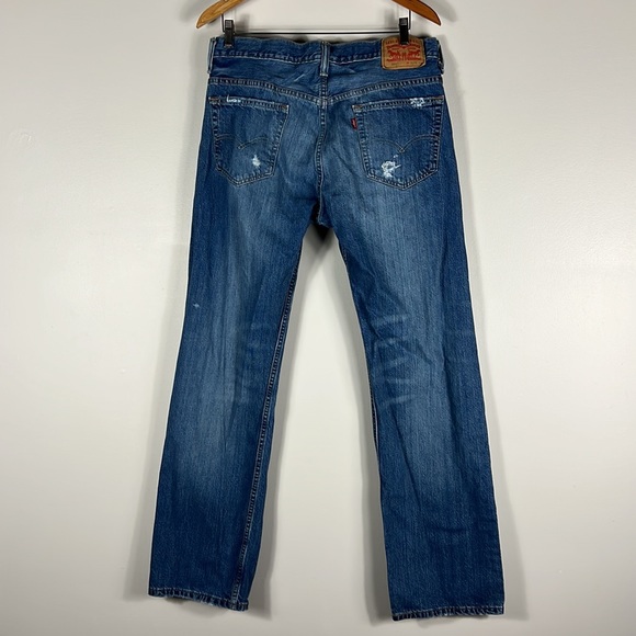 Levi’s 569 Medium Wash Distressed Boot Cut Jeans - Picture 3 of 5